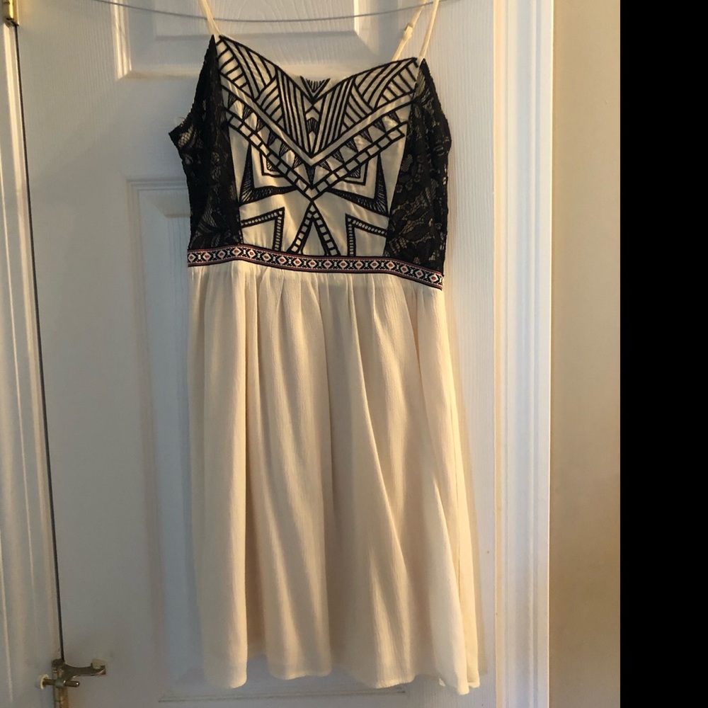 Cream and black dress